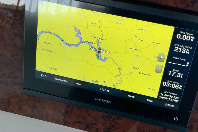 Slide: The Image of Garmin navigation display on 2000 Sea Ray Sundancer boat, showing map and GPS data. - 11