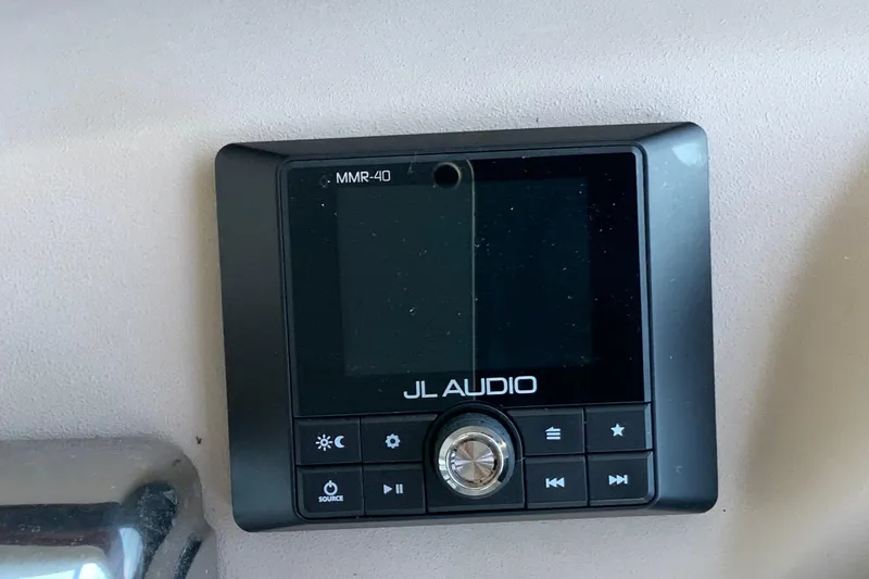 Slide: The Image of JL Audio MMR-40 control panel on 2000 Sea Ray Sundancer boat. - 9