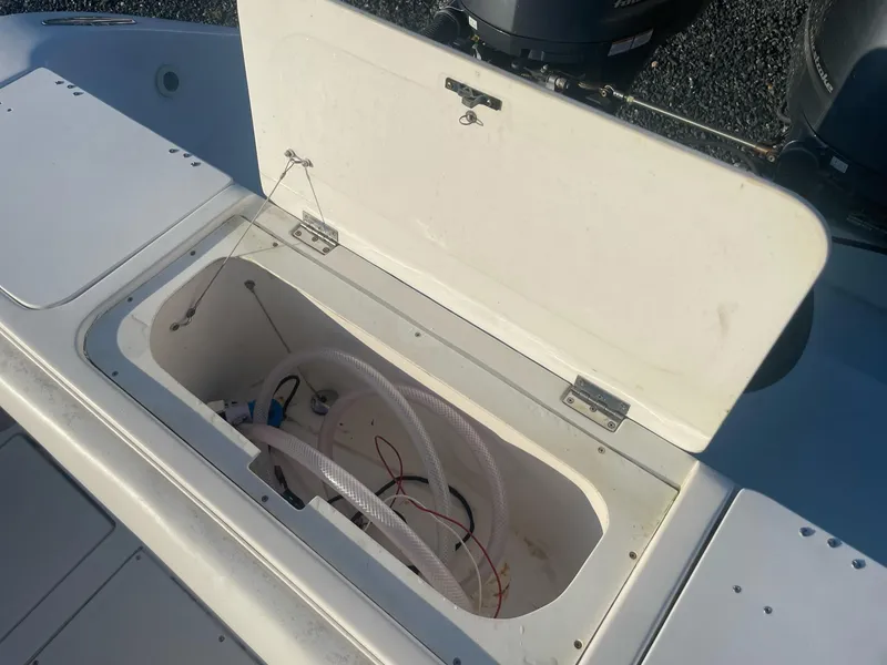 Slide: The Image of Open storage compartment on Marlago 35 boat, year 2005. - 11