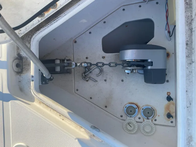 Slide: The Image of Anchor compartment of a 2005 Marlago 35 boat with chain mechanism. - 14