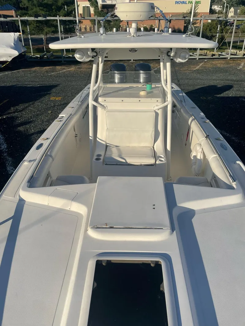 Slide: The Image of 2005 Marlago 35 boat, white deck, outdoor berth. - 15