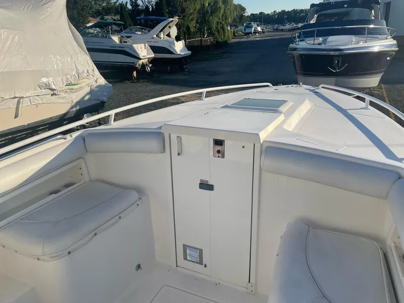 Slide: The Image of 2005 Marlago 35 boat, bow view at marina. - 16