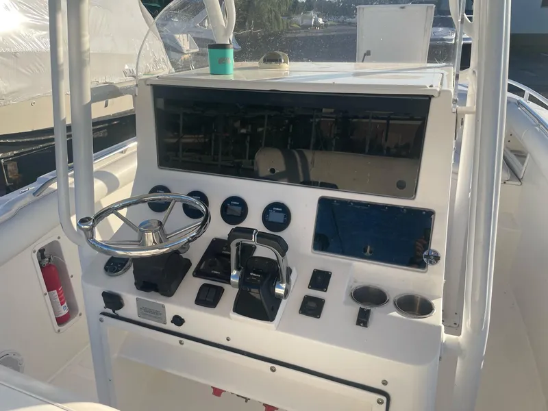 Slide: The Image of Helm console of a 2005 Marlago 35 boat. - 18