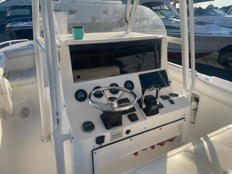 Slide: The Image of Helm console of a 2005 Marlago 35 boat. - 19