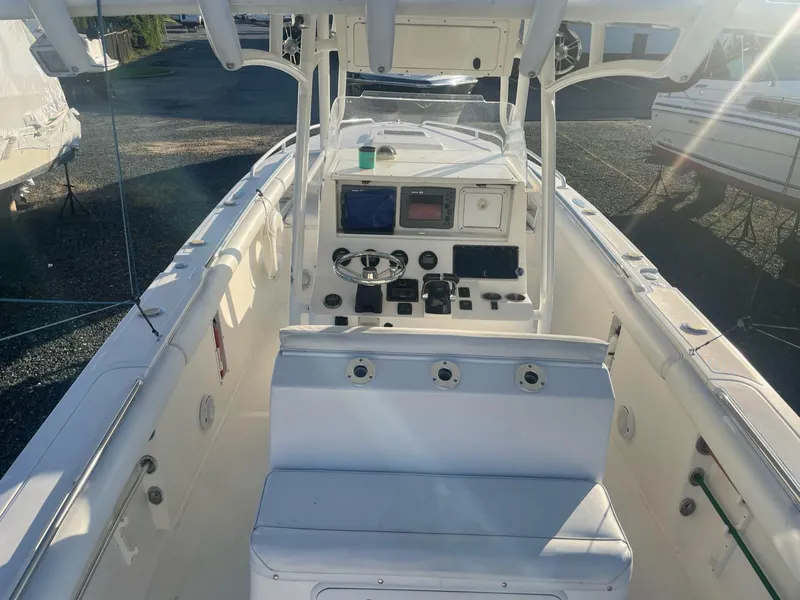 Slide: The Image of Interior view of a 2005 Marlago 35 boat, focusing on the helm console. - 3