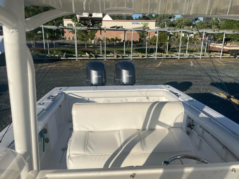 Slide: The Image of Interior view of a 2005 Marlago 35 boat with dual engines. - 8