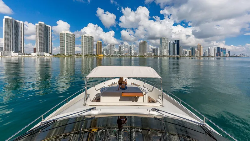 Slide: The Image of Luxury yacht Dominator 800 cruising near city skyline, 2015 model. - 10