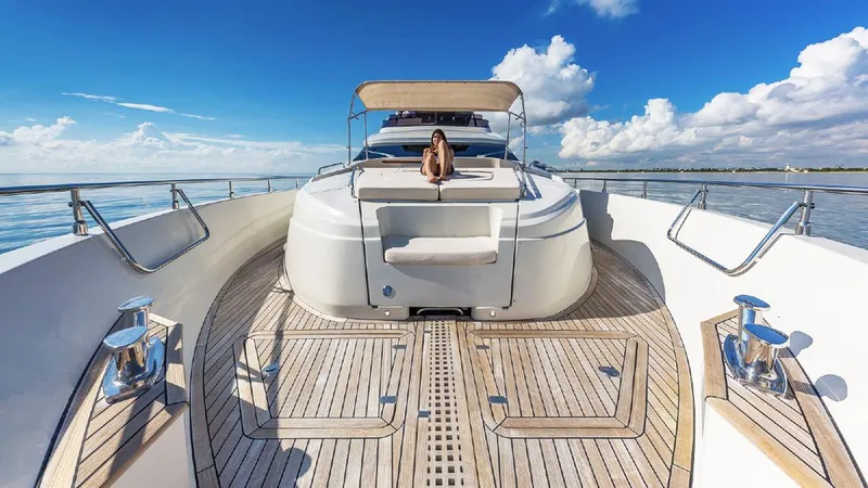 Slide: The Image of Luxurious 2015 Dominator 800 yacht with spacious deck and clear blue skies. - 11