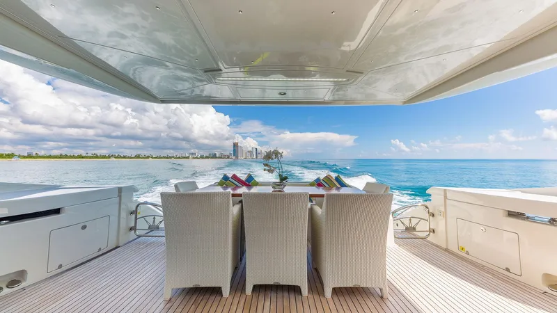 Slide: The Image of Luxury yacht Dominator 800, 2015 model, with elegant outdoor dining area and ocean view. - 20