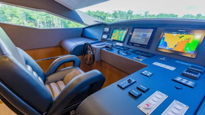 Slide: The Image of Luxurious 2015 Dominator 800 yacht cockpit with advanced navigation systems and plush seating. - 25