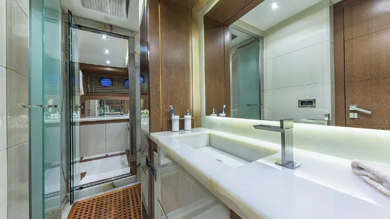 Slide: The Image of Luxurious bathroom in 2015 Dominator 800 yacht with modern fixtures and elegant design. - 29