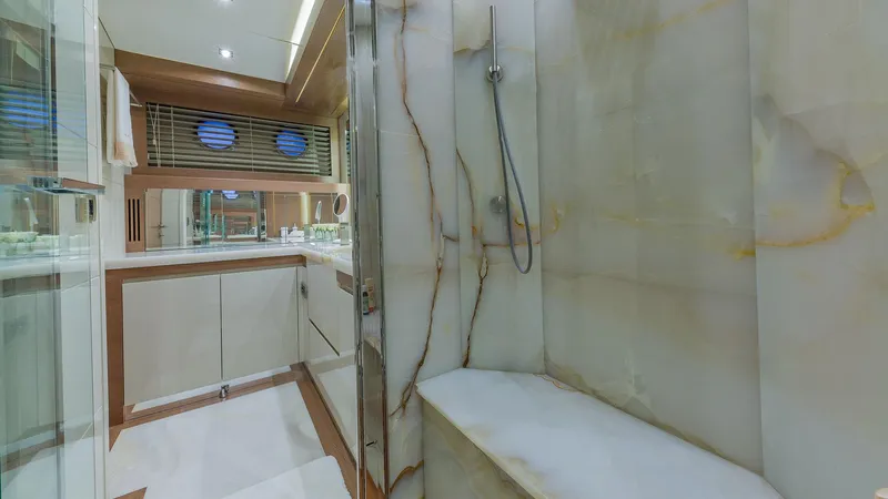 Slide: The Image of Luxurious bathroom interior of 2015 Dominator 800 yacht with marble shower and modern fixtures. - 31