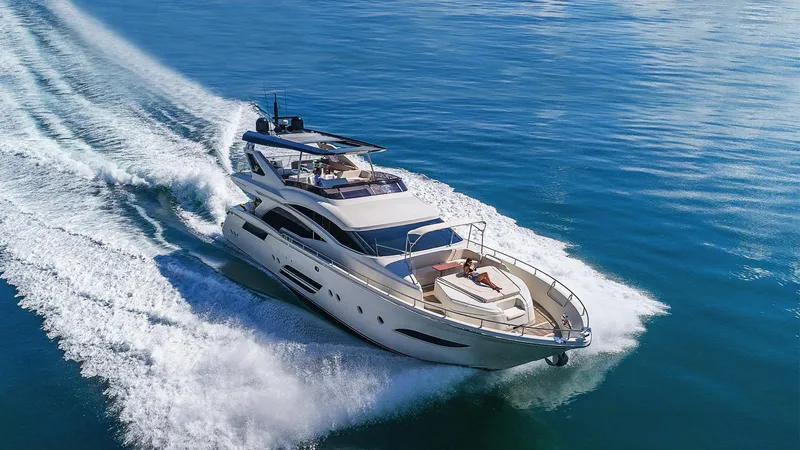 Slide: The Image of Luxurious 2015 Dominator 800 yacht cruising on open blue waters. - 4