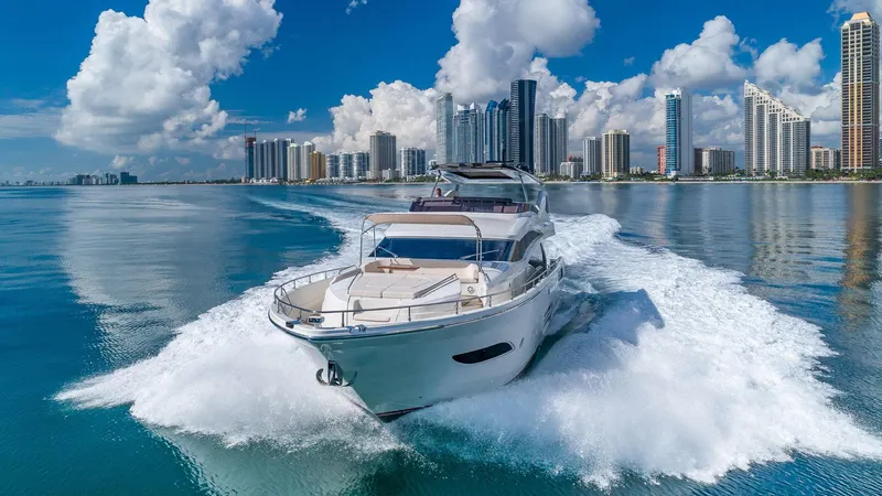 Slide: The Image of Luxury Dominator 800 yacht cruising near city skyline, 2015 model. - 5