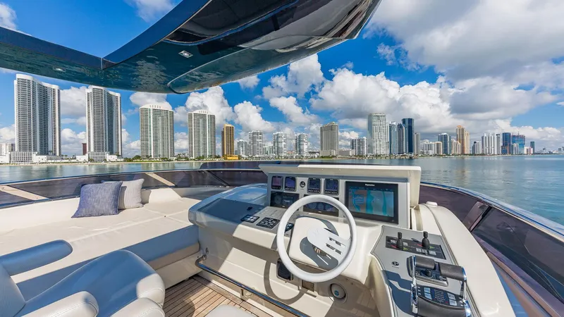 Slide: The Image of Luxurious 2015 Dominator 800 yacht helm with city skyline view. - 7