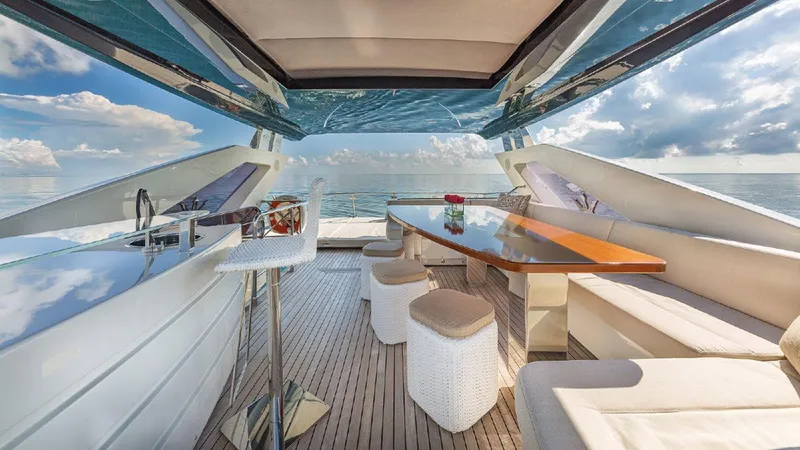 Slide: The Image of Luxurious 2015 Dominator 800 yacht interior with elegant seating and ocean view. - 9