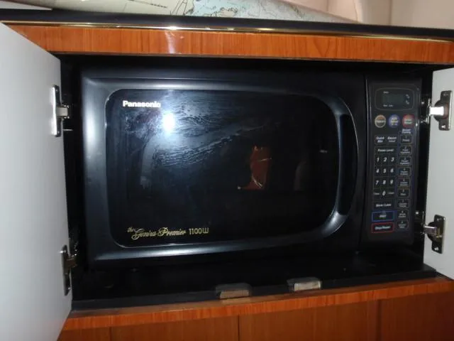 Slide: The Image of Panasonic microwave in 1999 Sea Ray 410 Express Cruiser kitchen cabinet. - 20
