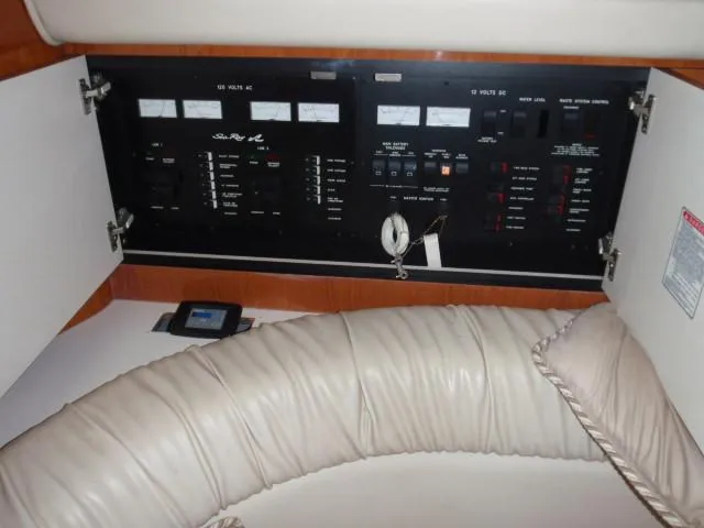 Slide: The Image of Electrical panel inside 1999 Sea Ray 410 Express Cruiser yacht. - 21