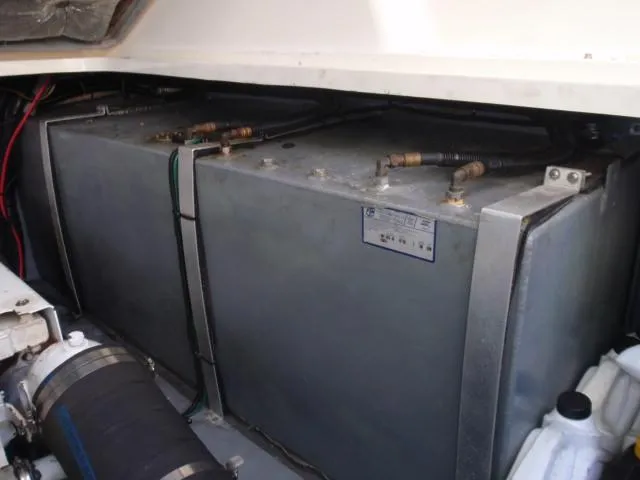 Slide: The Image of Engine compartment of 1999 Sea Ray 410 Express Cruiser showing fuel tanks. - 42