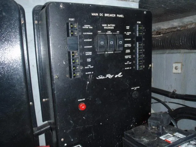 Slide: The Image of Main DC breaker panel on 1999 Sea Ray 410 Express Cruiser boat. - 44