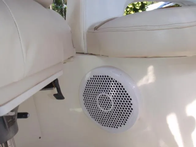 Slide: The Image of 1999 Sea Ray 410 Express Cruiser interior with speaker and seating detail. - 9