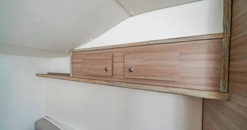Slide: The Image of Wooden cabinet with two drawers in a Conch 47, 2021 model interior. - 40