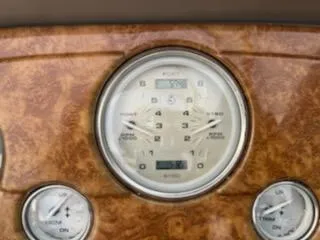 Slide: The Image of Close-up of the dashboard gauges on a 2007 Rinker 350 Express Cruiser. - 22