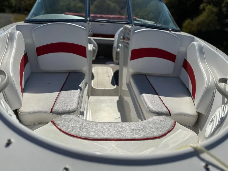 Slide: The Image of 2015 Ebbtide 176 SE Bow Rider interior with white and red seating. - 10