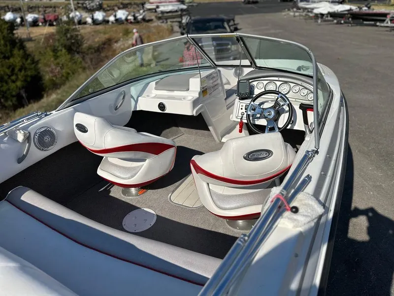 Slide: The Image of 2015 Ebbtide 176 SE Bow Rider interior with white and red seating. - 7