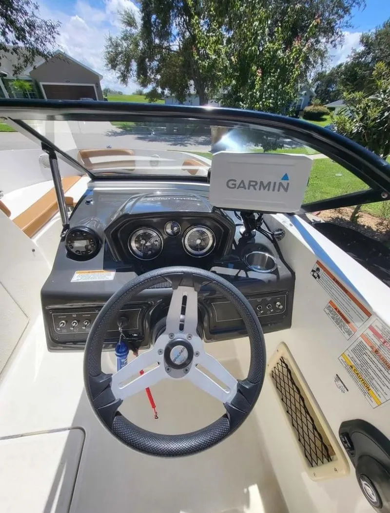 Slide: The Image of 2021 Bayliner VR6 Bowrider OB dashboard with Garmin navigation system. - 10