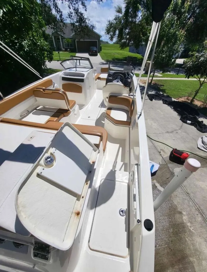 Slide: The Image of 2021 Bayliner VR6 Bowrider OB boat interior with seating and storage compartments. - 6