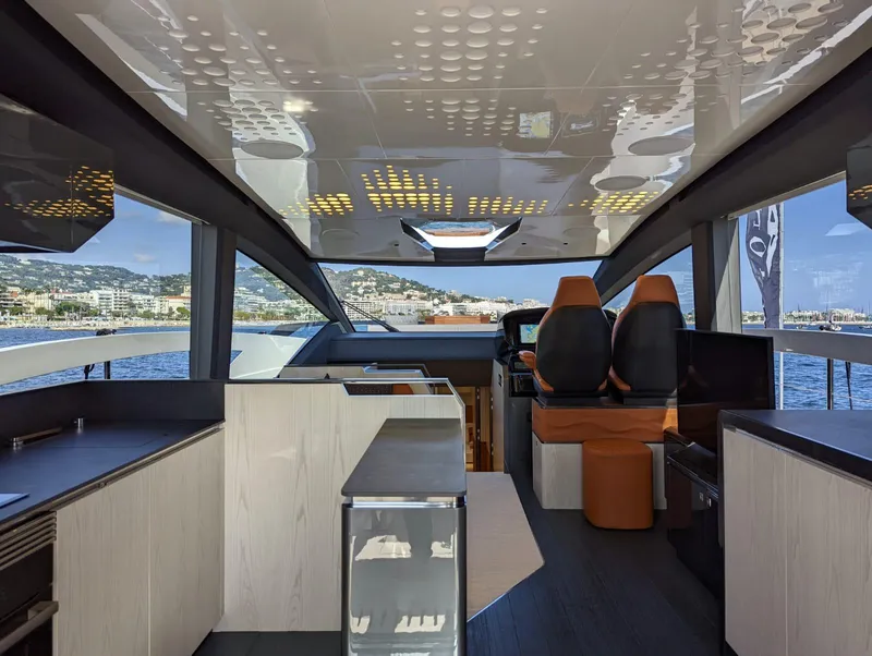 Slide: The Image of Luxurious interior of 2023 Astondoa 677 Coupe yacht with modern design and panoramic views. - 18