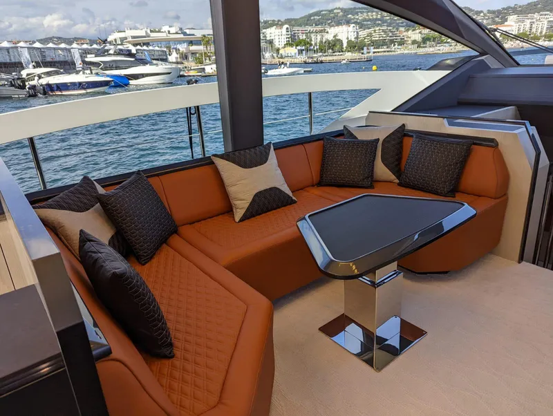 Slide: The Image of Luxurious seating area on 2023 Astondoa 677 Coupe yacht with modern design. - 22