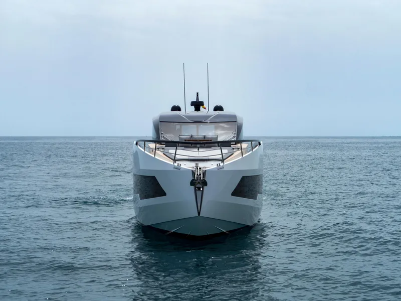 Slide: The Image of 2023 Astondoa 677 Coupe yacht on open sea, front view. - 3