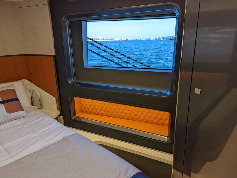 Slide: The Image of Luxurious cabin interior of 2023 Astondoa 677 Coupe yacht with ocean view window. - 39