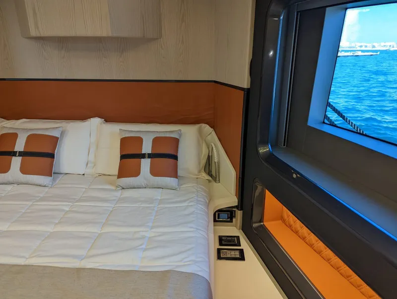 Slide: The Image of Luxurious cabin interior of 2023 Astondoa 677 Coupe yacht with ocean view. - 40
