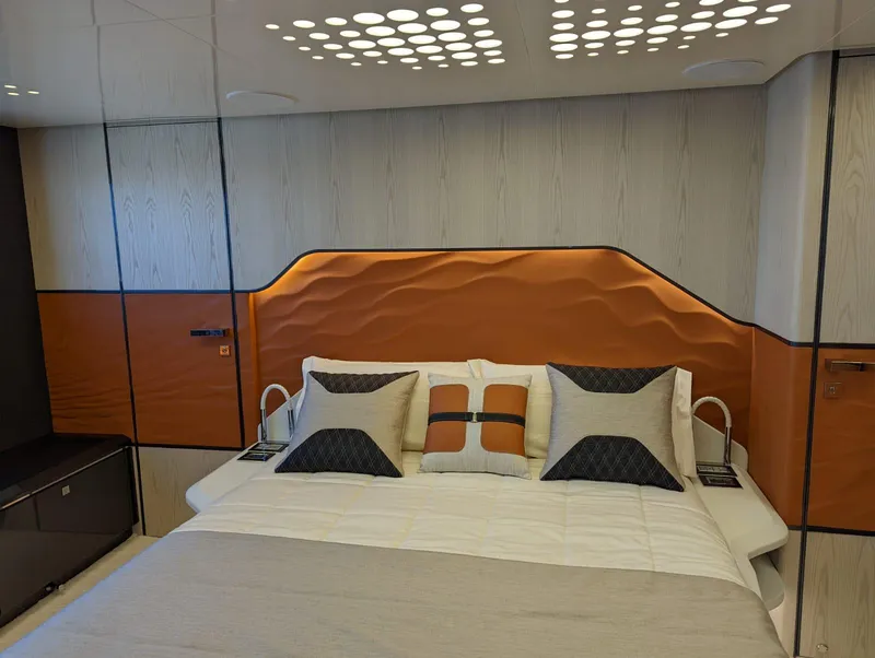Slide: The Image of Luxurious bedroom interior of 2023 Astondoa 677 Coupe yacht with modern design elements. - 47