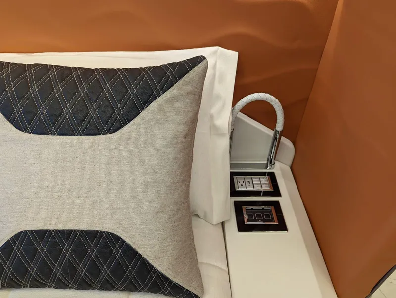 Slide: The Image of Luxury interior of 2023 Astondoa 677 Coupe with elegant pillow and modern controls. - 49