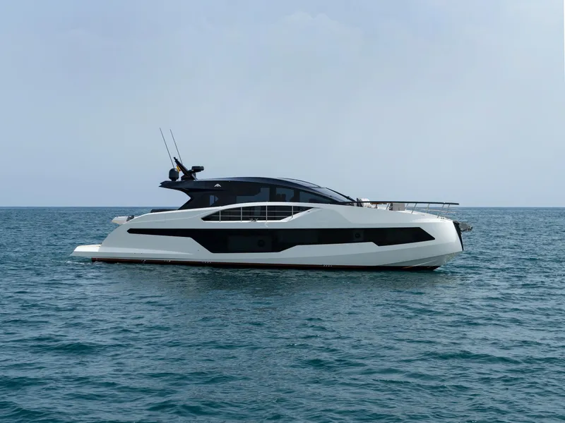 Slide: The Image of 2023 Astondoa 677 Coupe yacht on open sea. - 7