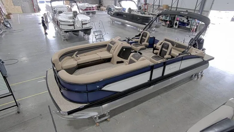 Slide: The Image of 2023 Barletta Cabrio 24UC pontoon boat in a showroom. - 7