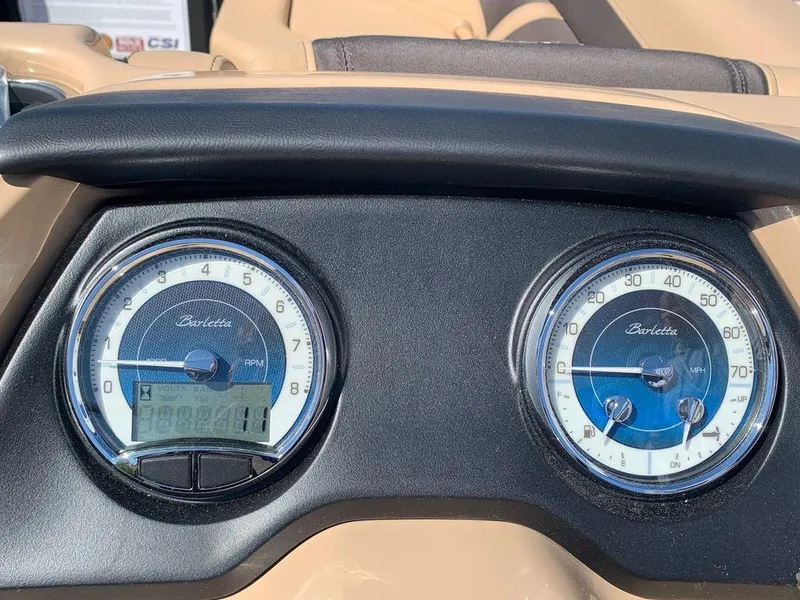 Slide: The Image of Dashboard of 2023 Barletta Cabrio 24UE with dual gauges. - 7