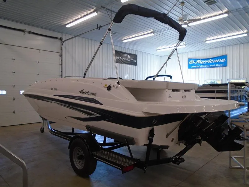 Slide: The Image of 2023 Hurricane SunDeck Sport 188 IO boat in showroom. - 10