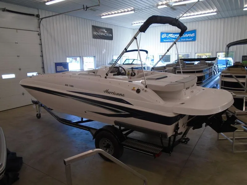 Slide: The Image of 2023 Hurricane SunDeck Sport 188 IO boat in showroom. - 20