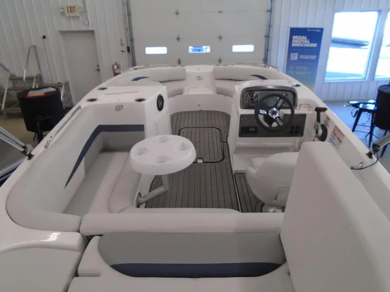 Slide: The Image of 2023 Hurricane SunDeck Sport 188 IO interior with seating and steering console. - 25