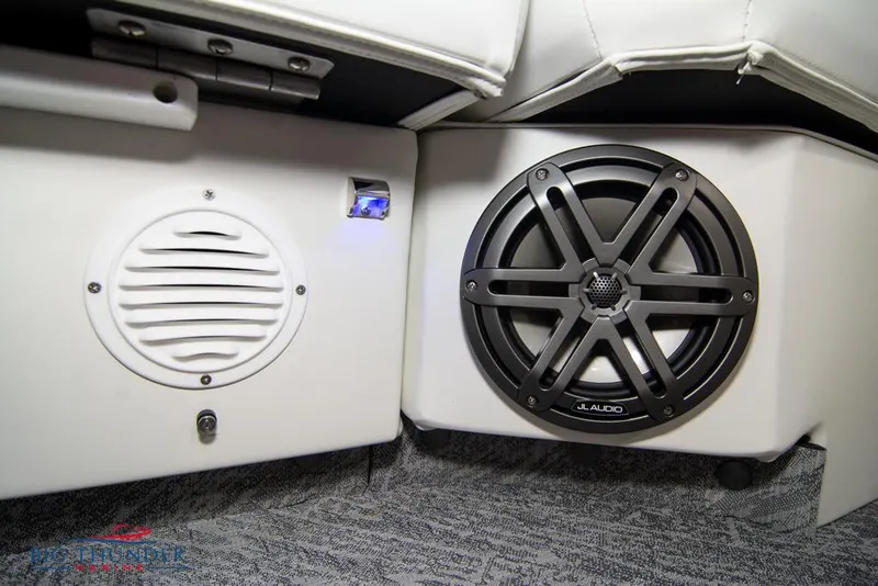 Slide: The Image of Close-up of 2022 JC NEPTOON 25 TT SPORT boat speakers and interior. - 15