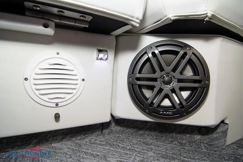 Slide: The Image of Close-up of 2022 JC NEPTOON 25 TT SPORT boat speakers and interior. - 16