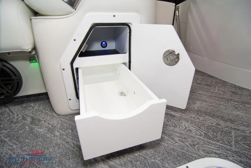Slide: The Image of Open storage compartment in 2022 JC NEPTOON 25 TT SPORT boat interior. - 19