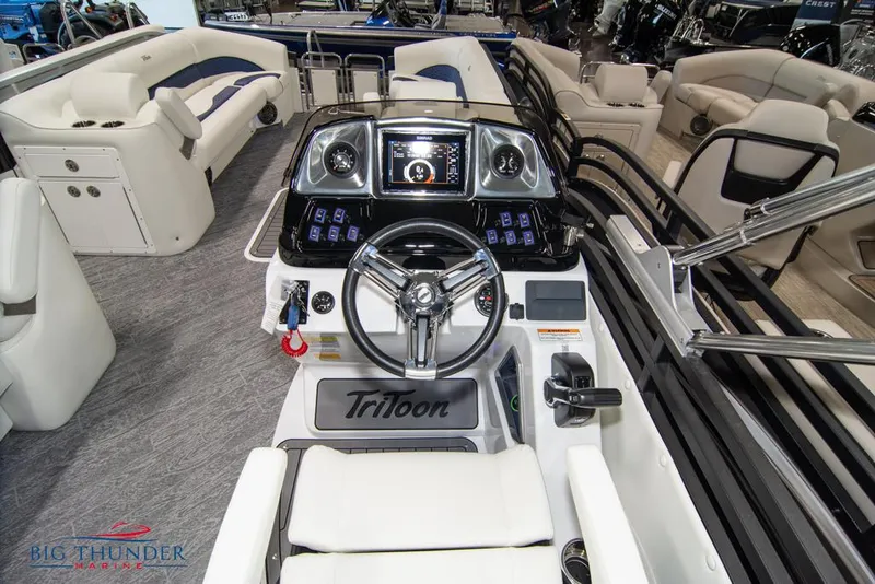 Slide: The Image of 2022 JC NEPTOON 25 TT SPORT boat interior with steering console and seating. - 24