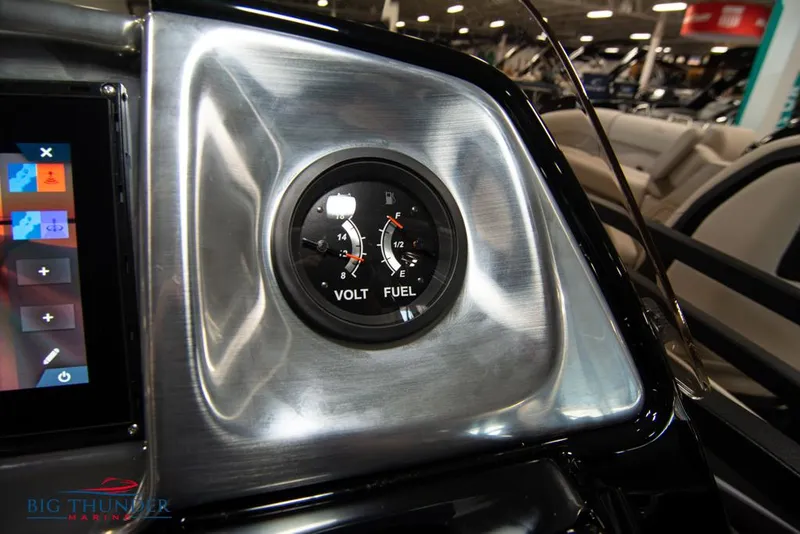 Slide: The Image of Close-up of 2022 JC NEPTOON 25 TT SPORT boat dashboard with volt and fuel gauges. - 29