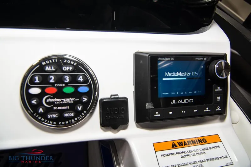 Slide: The Image of Control panel of a 2022 JC NEPTOON 25 TT SPORT boat with JL Audio system. - 33